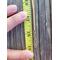 Chain end of the necklace against a tape measure. Necklace measures 18 inches with 1-inch extender. 